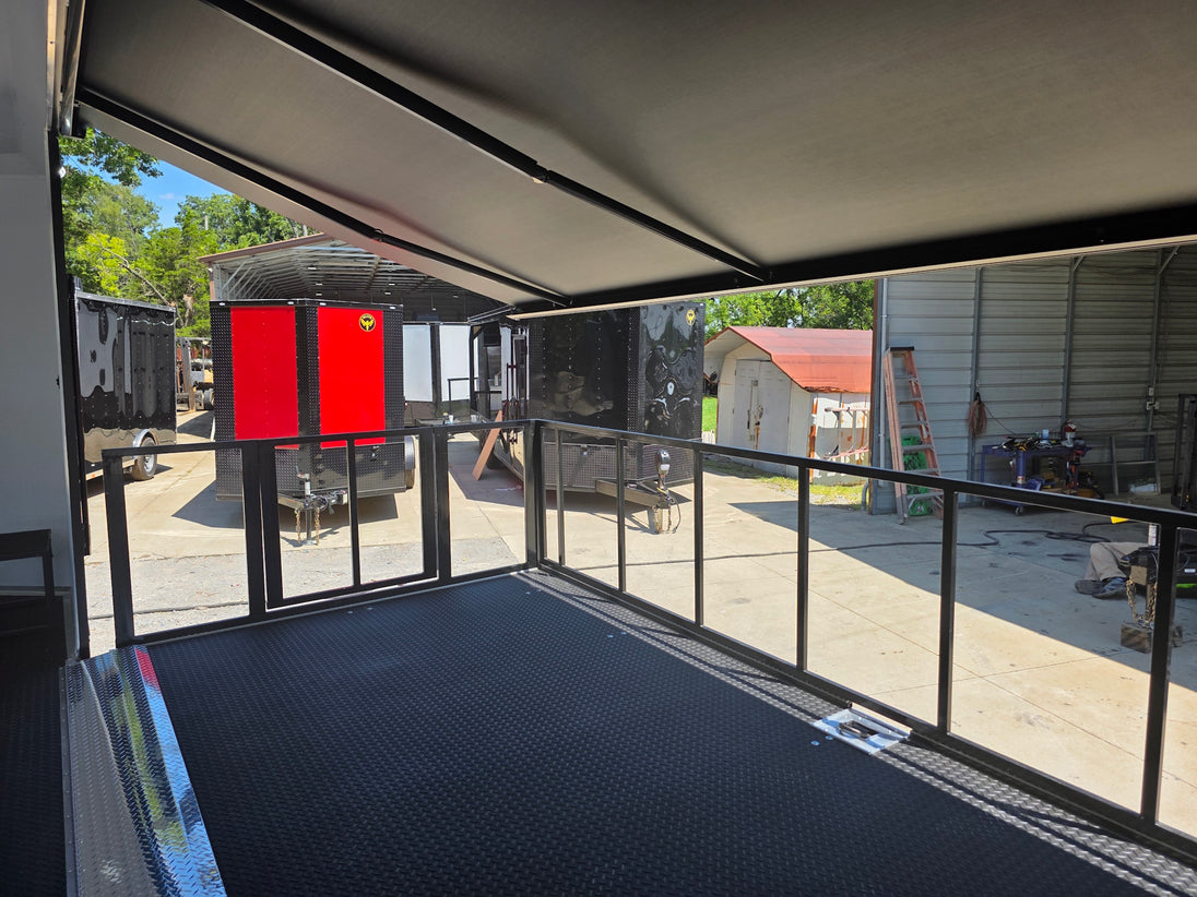  8.5x24 Black Stage trailer-34619 Side stage back left angle picture 
