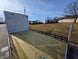 8.5x24 Hybrid White Enclosed V-Nose Trailer (2) 7000lb Axles back left view picture 