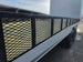8.5x24 Hybrid White Enclosed V-Nose Trailer (2) 7000lb Axles expanded metal  angled view picture 