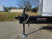 8.5x24 Hybrid White Enclosed V-Nose Trailer (2) 7000lb Axles jack and chain view picture