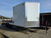 8.5x24 Hybrid White Enclosed V-Nose Trailer (2) 7000lb Axles left angled view picture with ramp down 