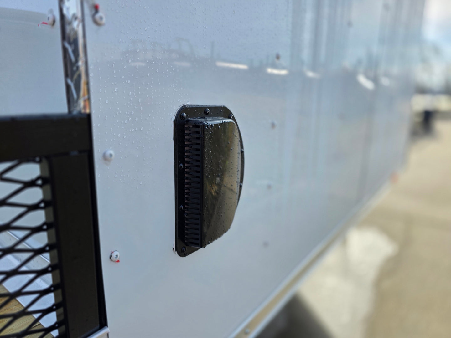 8.5x24 Hybrid White Enclosed V-Nose Trailer (2) 7000lb Axles vent angled view picture 