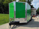 8.5x24 Lime Green Enclosed Hybrid (2) 7,000lb axles Open front right angle picture 