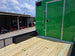 8.5x24 Lime Green Enclosed Hybrid (2) 7,000lb axles Utility back right angle picture 