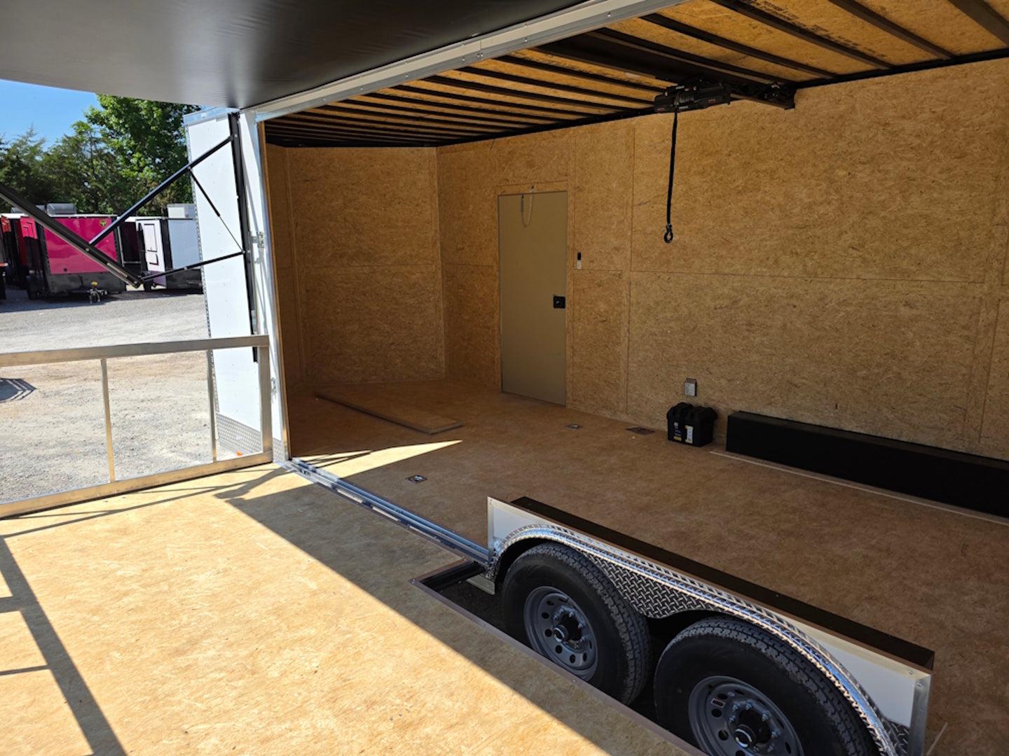 8.5x24 Walk on Roof Stage trailer Interior back right-angle stage view 