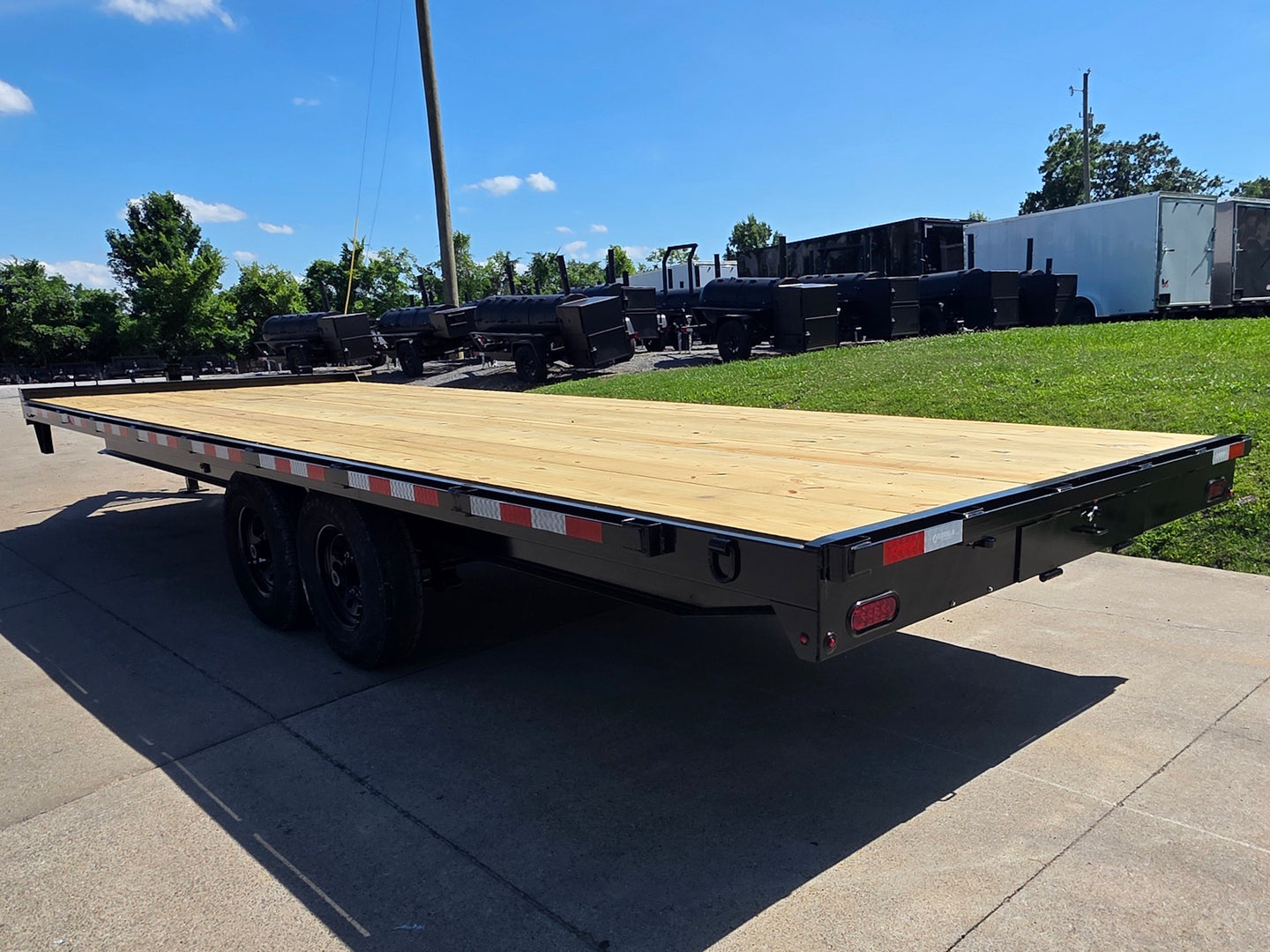 8.5x25 Straight Deckover Trailer (2) 7K Axles with Slide Out Ramps 14K GVWR Back left angle picture 
