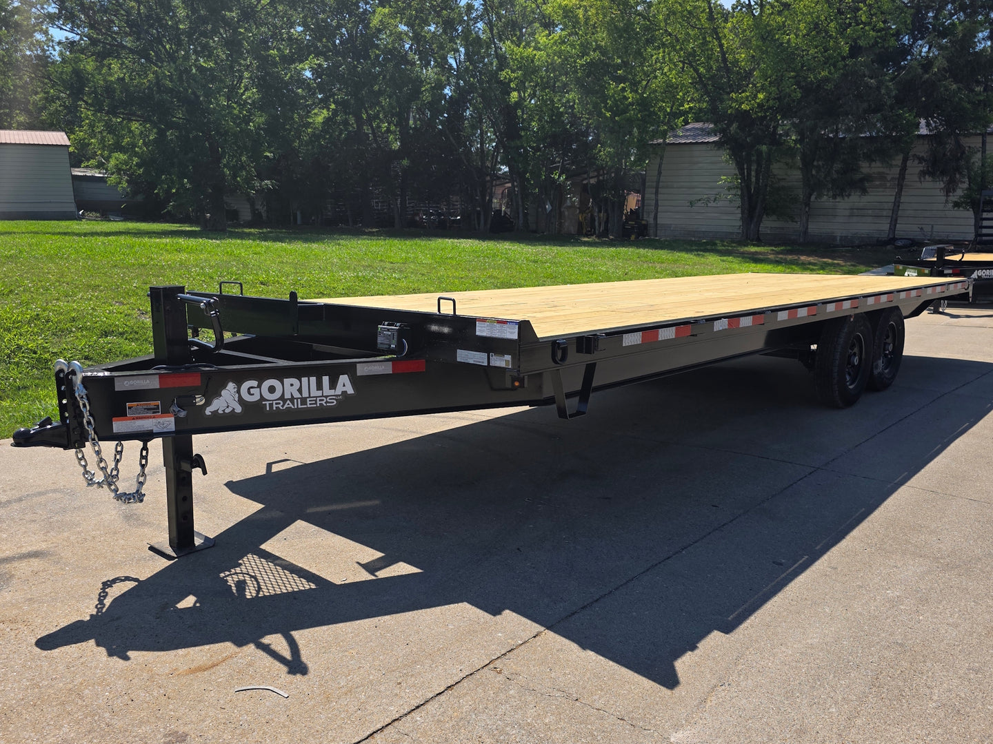 8.5x25 Straight Deckover Trailer (2) 7K Axles with Slide Out Ramps 14K GVWR Front right angle picture 