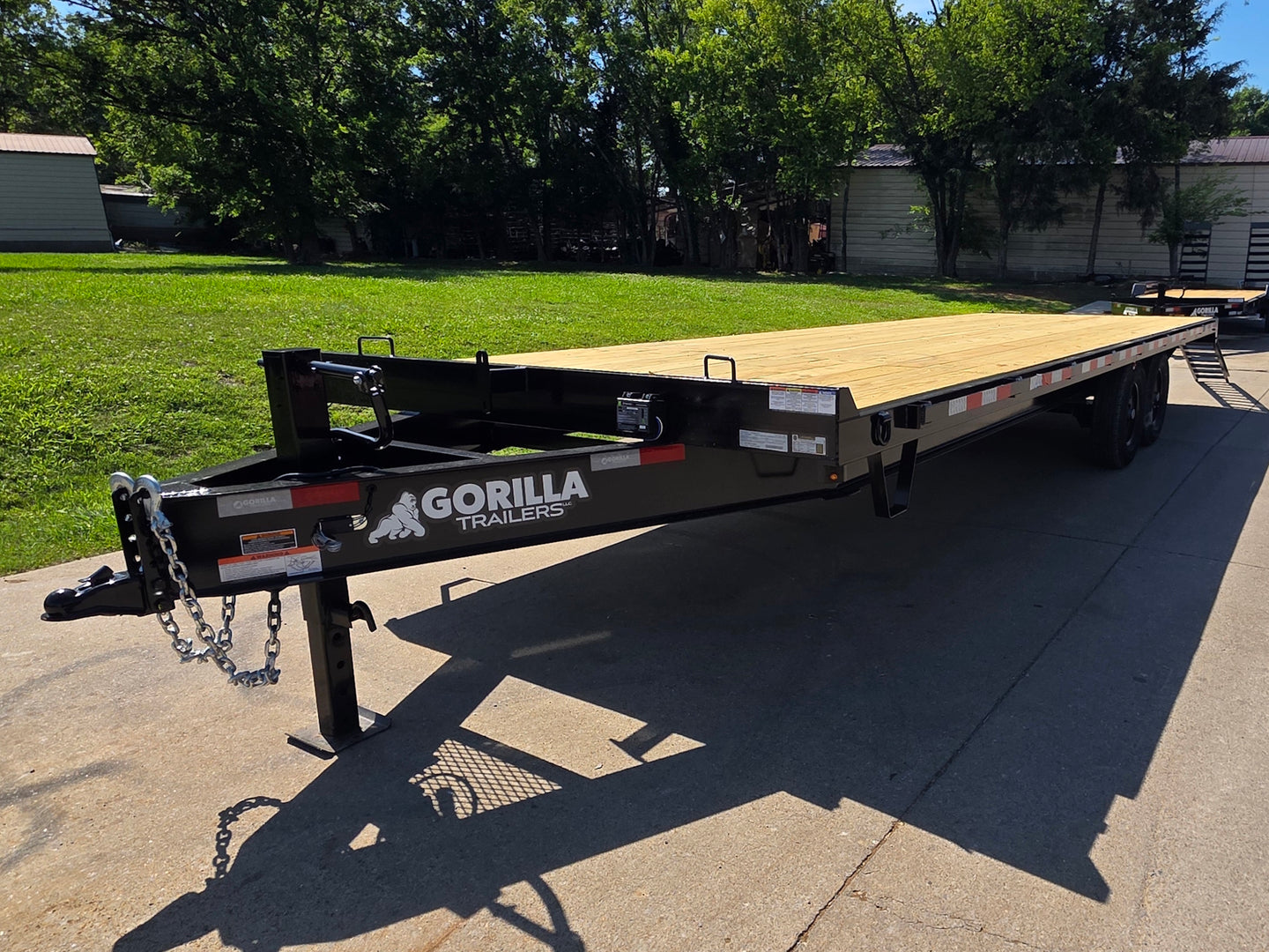 8.5x25 Straight Deckover Trailer (2) 7K Axles with Slide Out Ramps 14K GVWR Open front right angle picture 