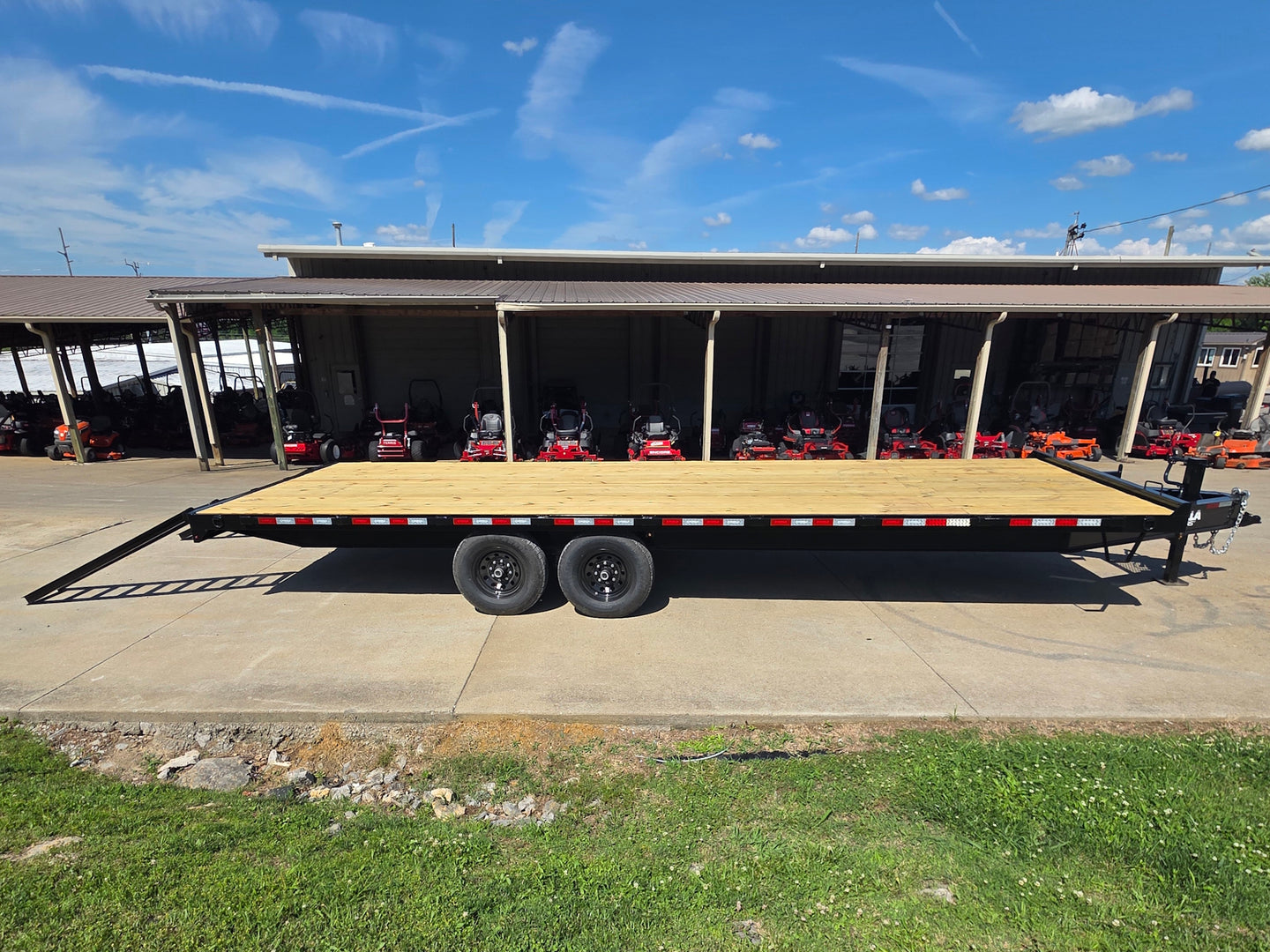 8.5x25 Straight Deckover Trailer (2) 7K Axles with Slide Out Ramps 14K GVWR Open left angle picture 