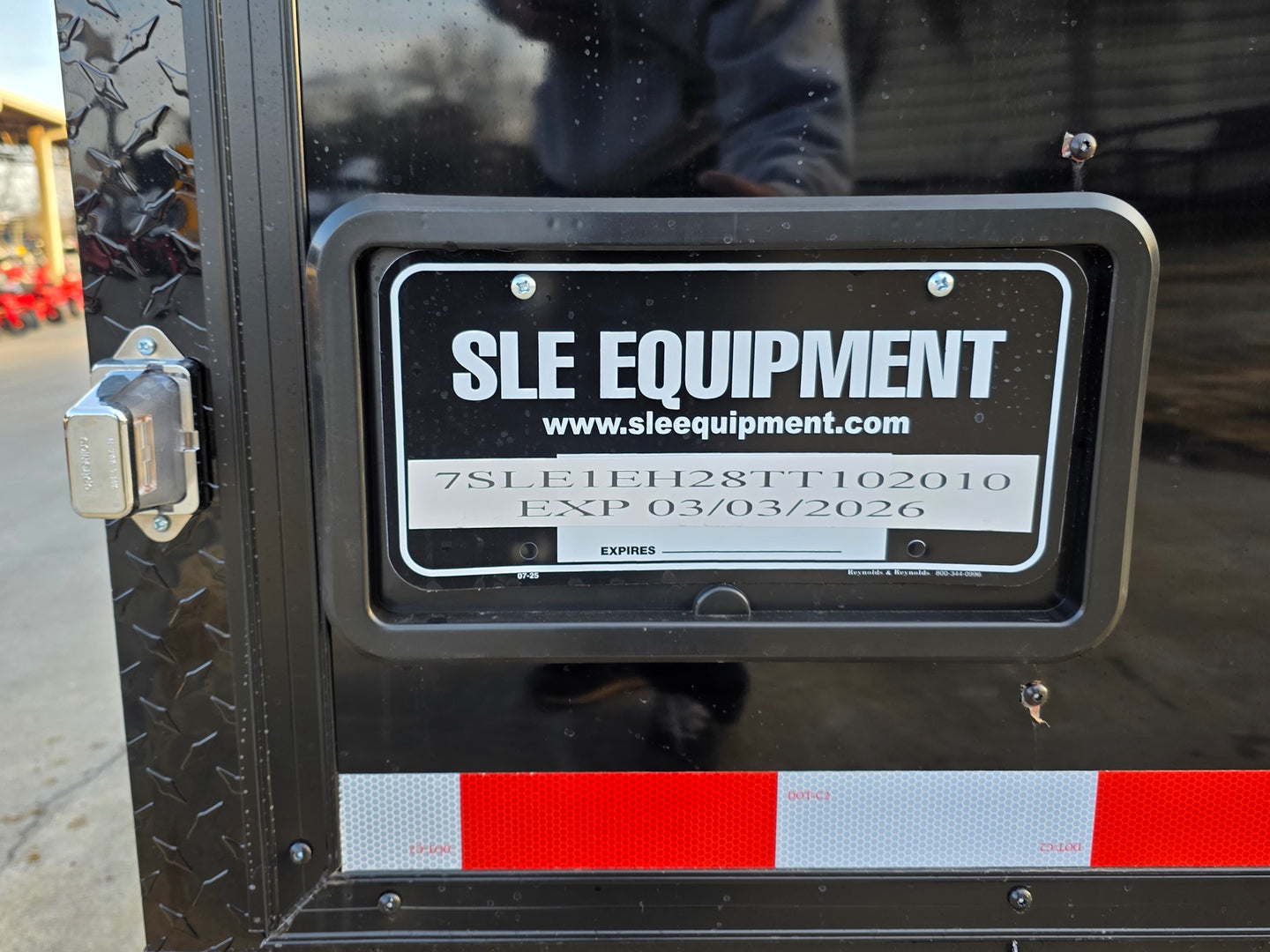 8.5x28 Black V-Nose Enclosed Trailer with Blackout Pkg (2) 7K Axles with D rings license plate view picture 