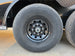 8.5x28 Black V-Nose Enclosed Trailer with Blackout Pkg (2) 7K Axles with D rings wheel and tire view picture 