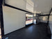 8.5x28  Grey Enclosed Trailer For Race, Show Car Fully Loaded (2) 7,000LB Axle 14K GVWR Interior back right angle picture 