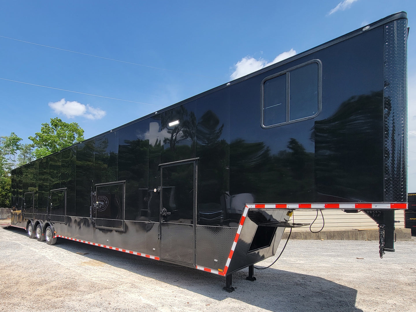 8.5x53 Gooseneck Black Showcase Car Hauler With Beaver Tail Closed front left angle picture.