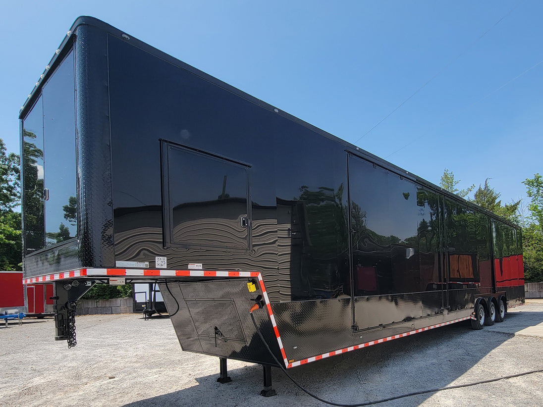 8.5x53 Gooseneck Black Showcase Car Hauler With Beaver Tail Closed front right-angle picture.