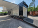 8.5x53 Gooseneck Black Showcase Car Hauler With Beaver Tail Open back left angle picture 
