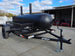 BBQ Smoker 300 Gallon Pull Behind Trailer 2 Door 1/2 Smoker 1/2 Charcoal Grill front left view picture 