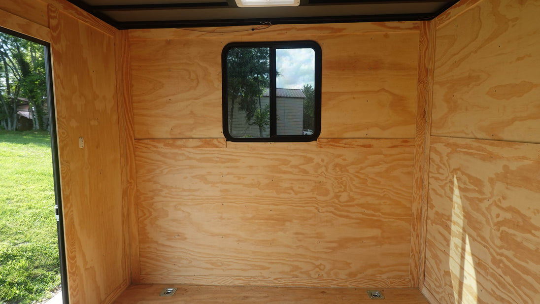 8.5x24 Black W/Black Out Hybrid Enclosed Trailer V-Nose (2) 7,000lb With Rails Window