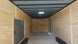 8.5X24 Black Enclosed Trailer (2) 5,200lb Axles Escape Door Inside Front