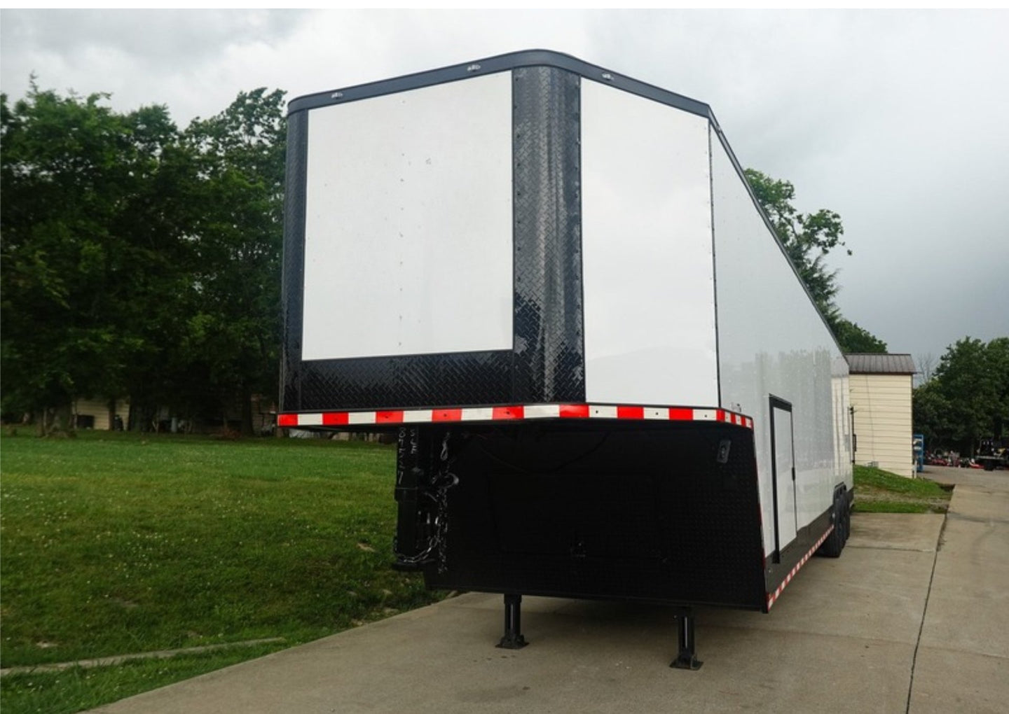 8.5x42 White With Black Out Trim Gooseneck King Pin Fifth Wheel Enclosed Trailer (3) 8K Front Left View