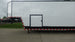 8.5x42 White With Black Out Trim Gooseneck King Pin Fifth Wheel Enclosed Trailer (3) 8K Front Left Side View