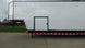 8.5x42 White With Black Out Trim Gooseneck King Pin Fifth Wheel Enclosed Trailer (3) 8K Front Left Side View