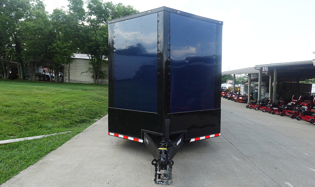 8.5X36 Indigo Blue With Black Out Enclosed Trailer With Escape Doors E Track Floor (3) 7K Axles 21K GVWR 
Front