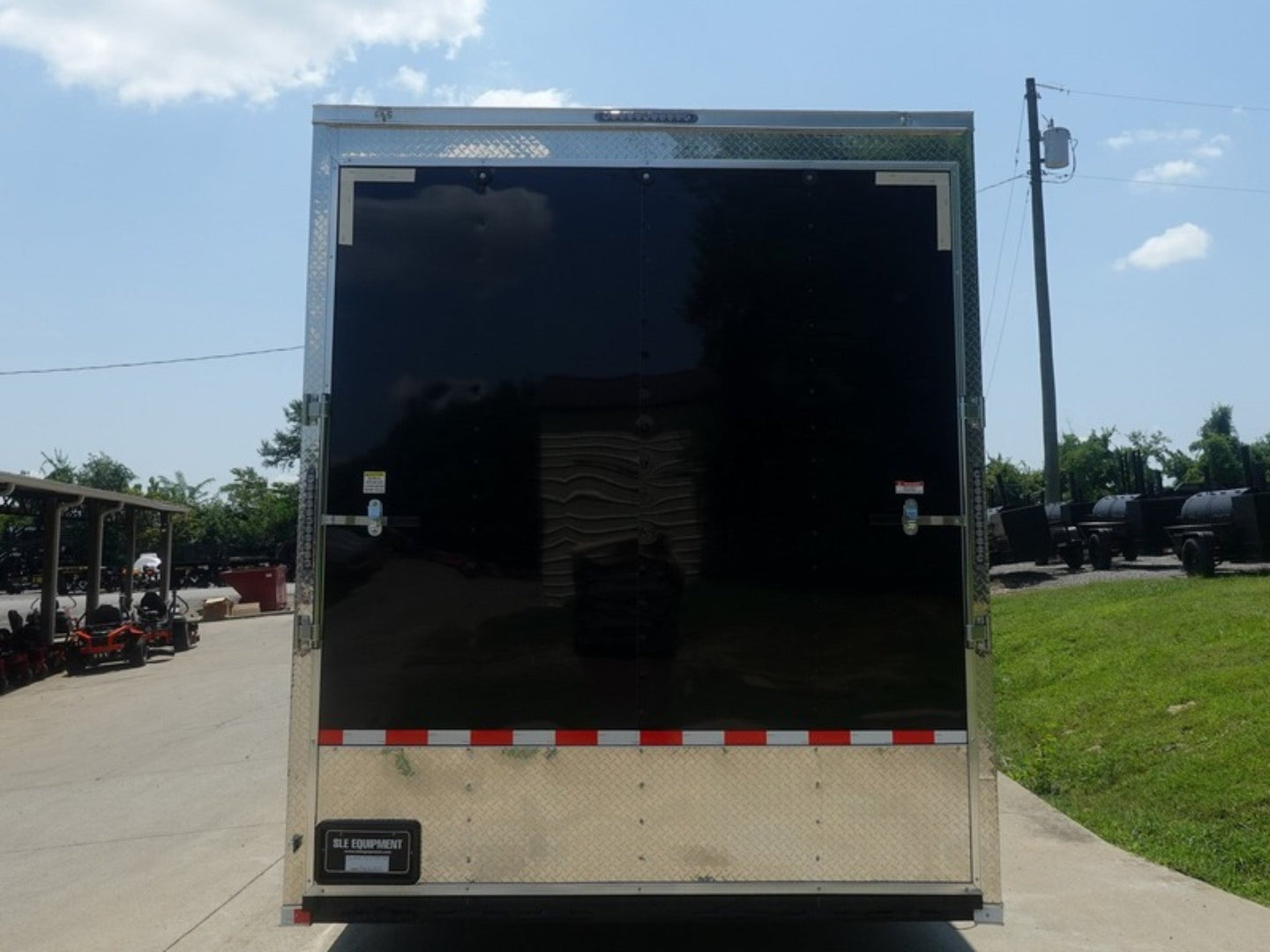 8.5x30 Black Enclosed 2-5200lb Axles 9' Interior Height with Winch Rear