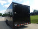 8.5x24 V-Nose Enclosed Trailer (2) 7000LB Axles with Wench Lift Rear Left