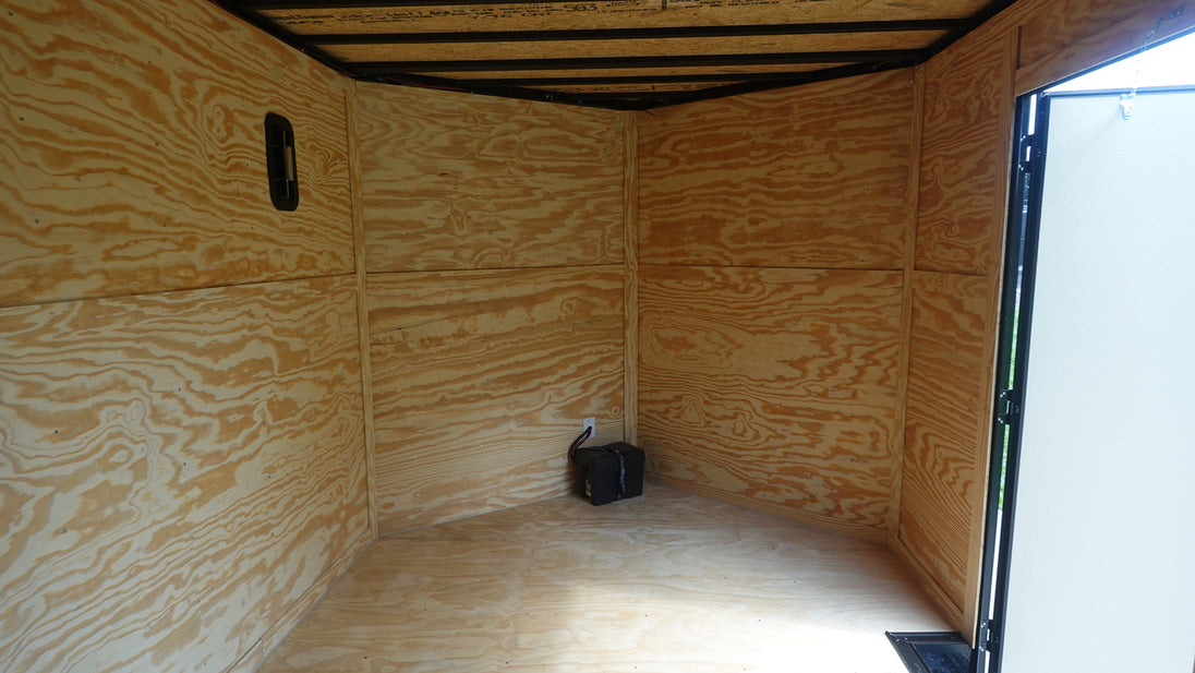 8.5x24 V-Nose Enclosed Trailer (2) 7000LB Axles with Wench Lift Inside Front