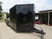 8.5x24 Black W/Black Out Hybrid Enclosed Trailer V-Nose (2) 7,000lb With Rails Front Right