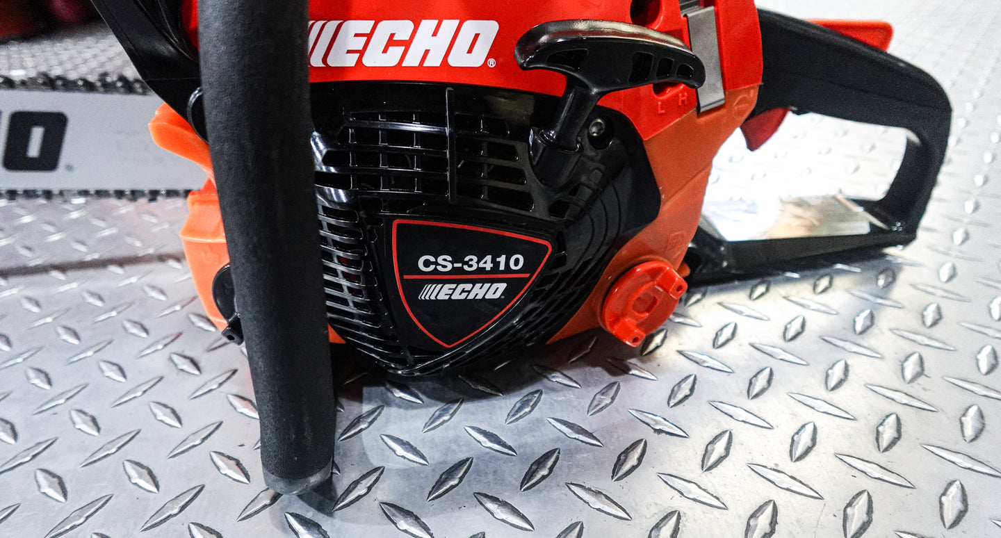 Echo CS-3410 16" Gas Chainsaw 34.4cc with Rear Handle, Hand View. 
