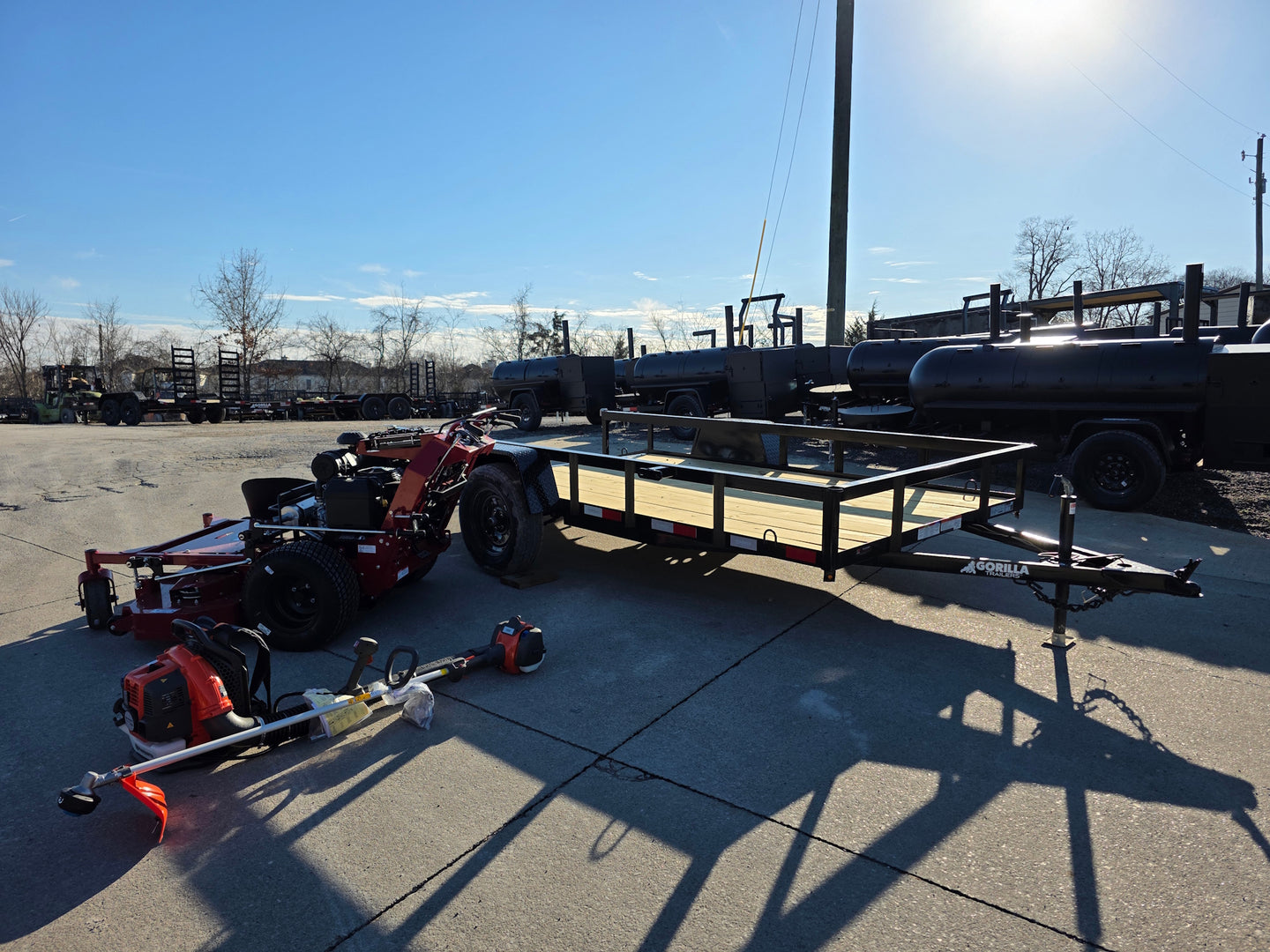 Ferris 5901891 FW45 52" Walk Behind Mower Util Trailer Handhelds Bundle right view picture with ramp down 