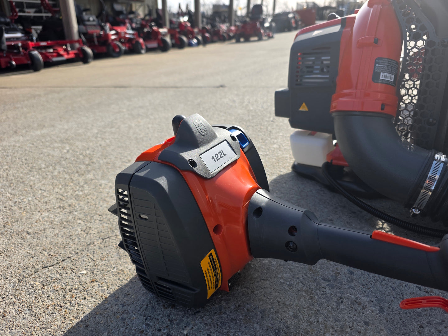 Ferris 5901940 SRSZ1 48" Stand-On Mower 6x12 Enclosed Trailer Handheld Package front trimmer view picture 