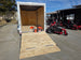 Ferris 5901940 SRSZ1 48" Stand-On Mower 6x12 Enclosed Trailer Handheld Package left side view picture 