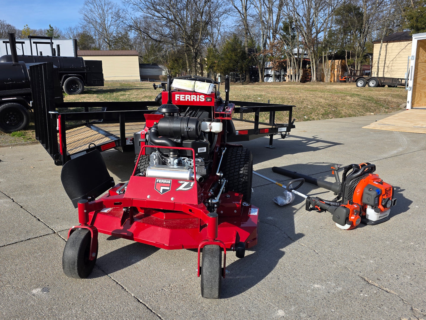 Ferris 5901940 SRSZ1 48" Stand On Mower 5x10 Utility Handheld Package left angled view picture 