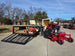 Ferris 5901940 SRSZ1 48" Stand On Mower 5x10 Utility Handheld Package rear right angled view picture with ramp down 