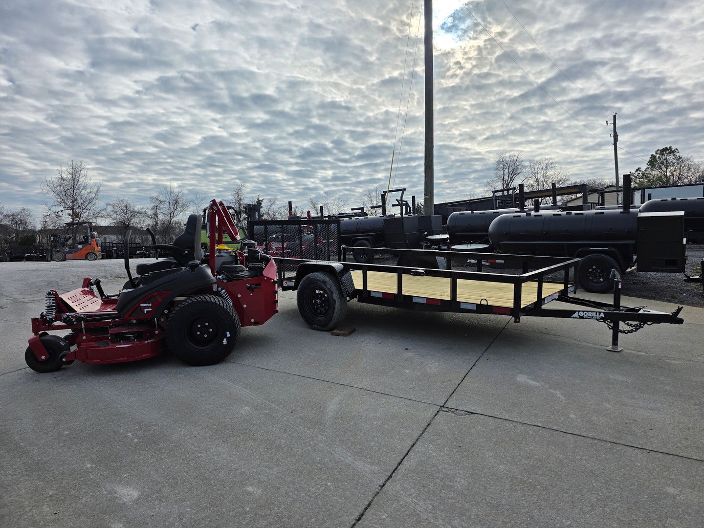 Ferris 5902064 ISX3300 60" Zero Turn Mower Util Trailer Bundle right angled view picture with ramp up 