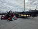 Ferris 5902064 ISX3300 60" Zero Turn Mower Utility Trailer Handheld Bundle right angled view picture 