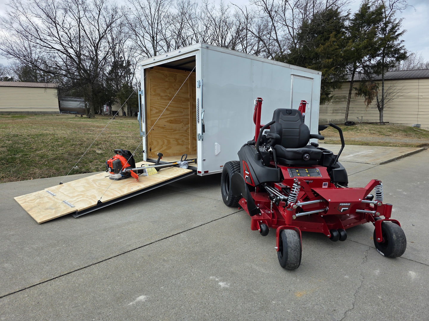 Ferris 5902065 ISX3300 60" Zero Turn Mower Encl Trailer Handhelds Bundle left angled view picture