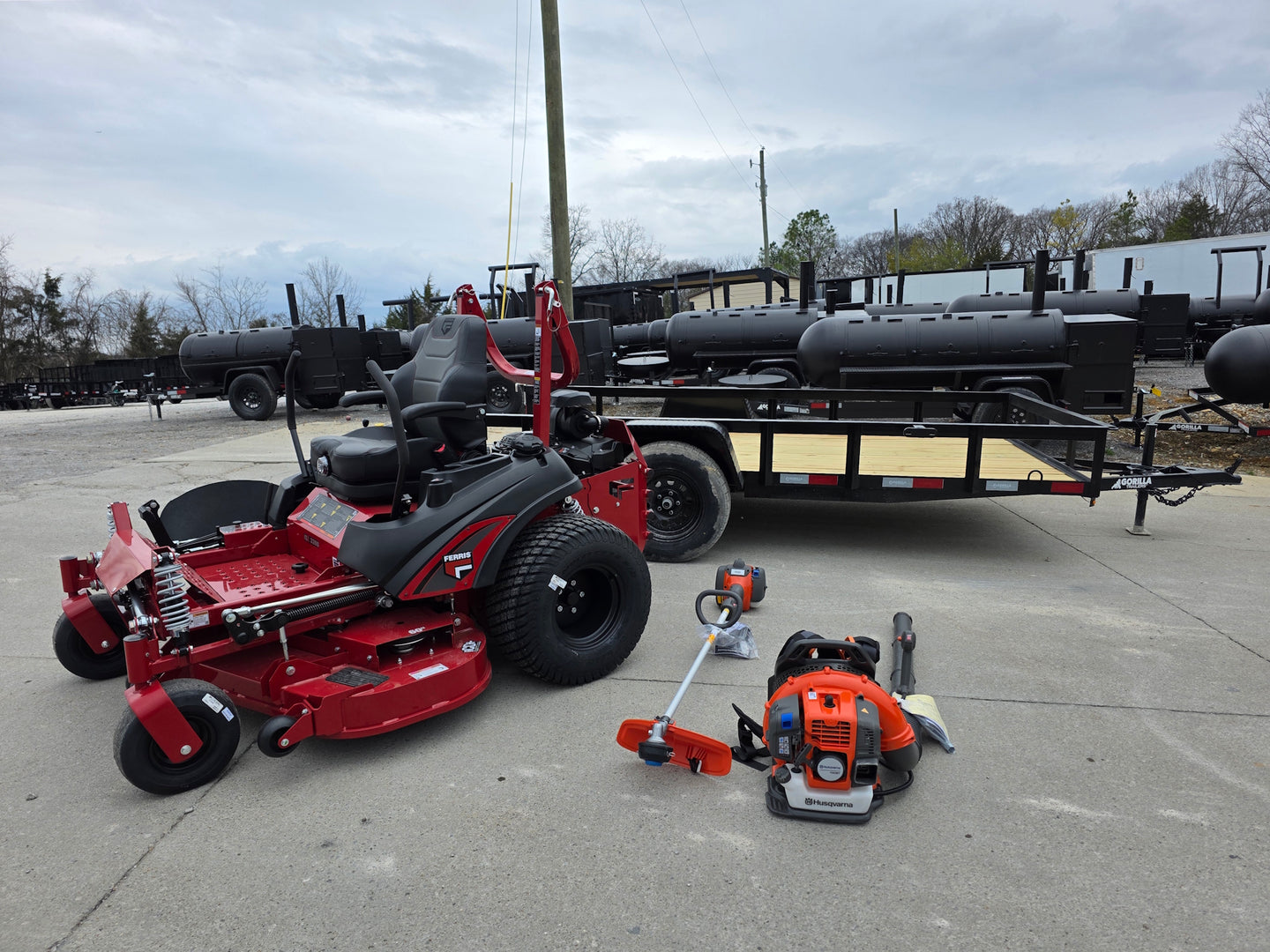 Ferris 5902065 ISX3300 60" Zero Turn Mower Util Trailer Handhelds Bundle (Instant Rebate Included) front overall view picture 