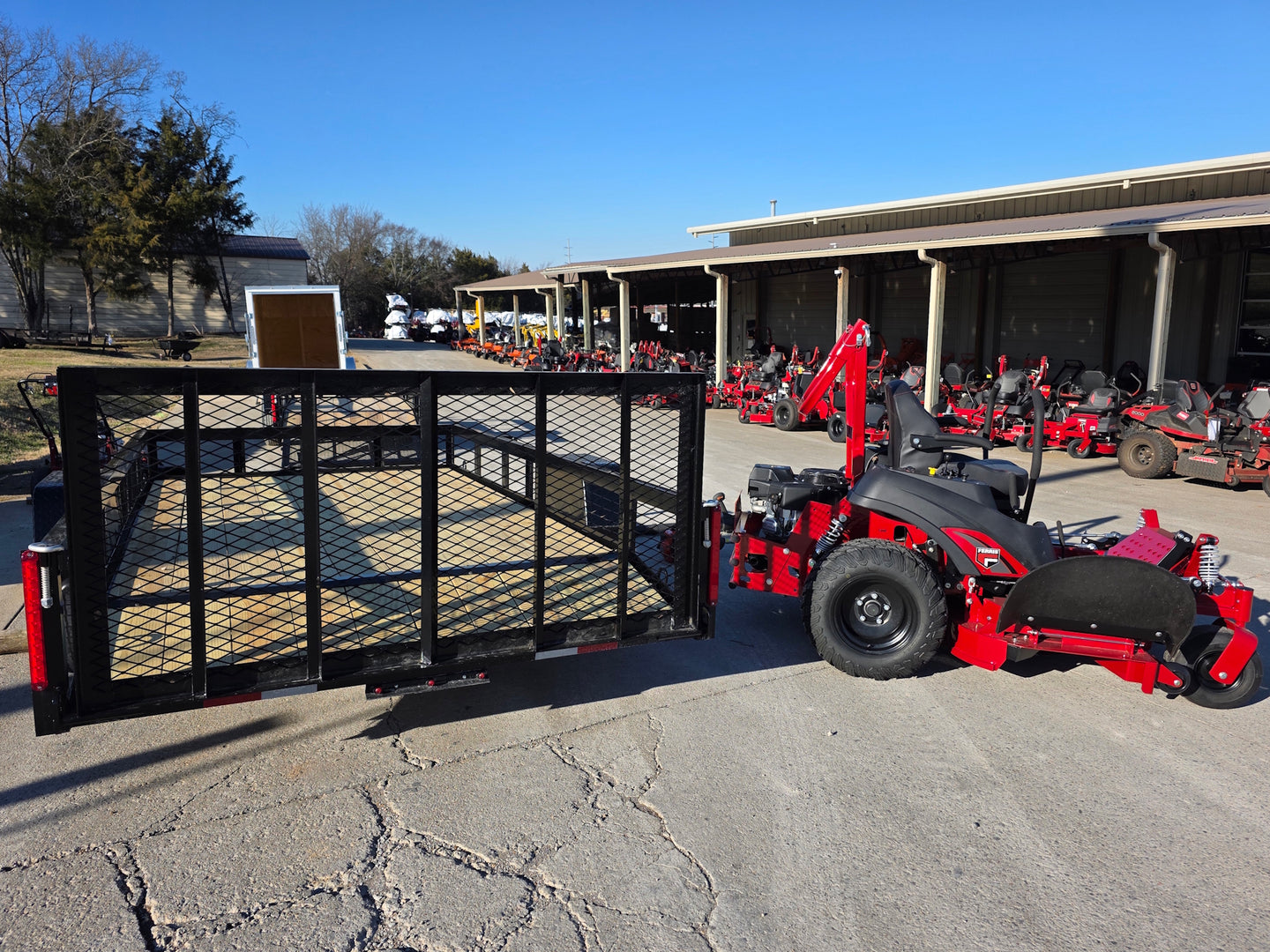 Ferris 5902075 60" ISX800 Zero Turn Mower Util Trailer Handhelds Bundle left  mower side view picture 
