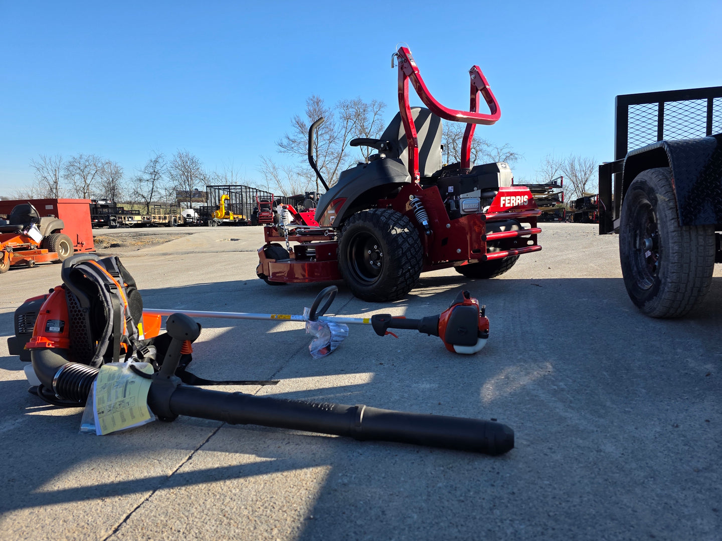 Ferris 5902075 60" ISX800 Zero Turn Mower Util Trailer Handhelds Bundle side hand held view picture 
