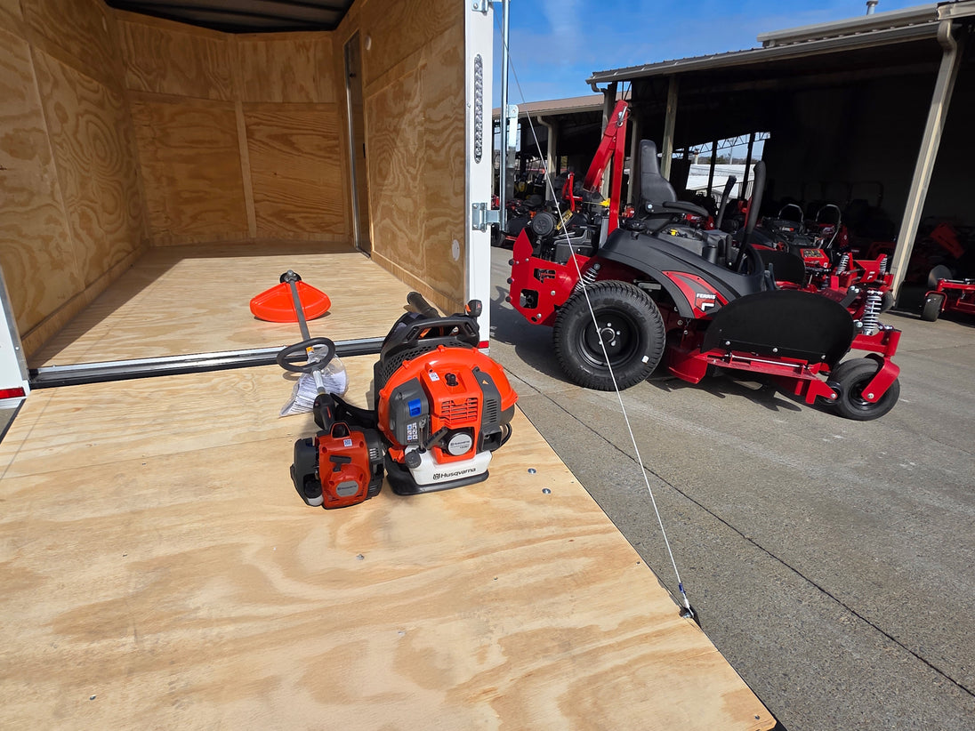 Ferris 5902078 ISX2200 60" Zero Turn Mower Encl Trailer Handhelds Bundle angled and held view picture 