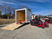 Ferris 5902078 ISX2200 60" Zero Turn Mower Encl Trailer Handhelds Bundle left angled picture with ramp down 