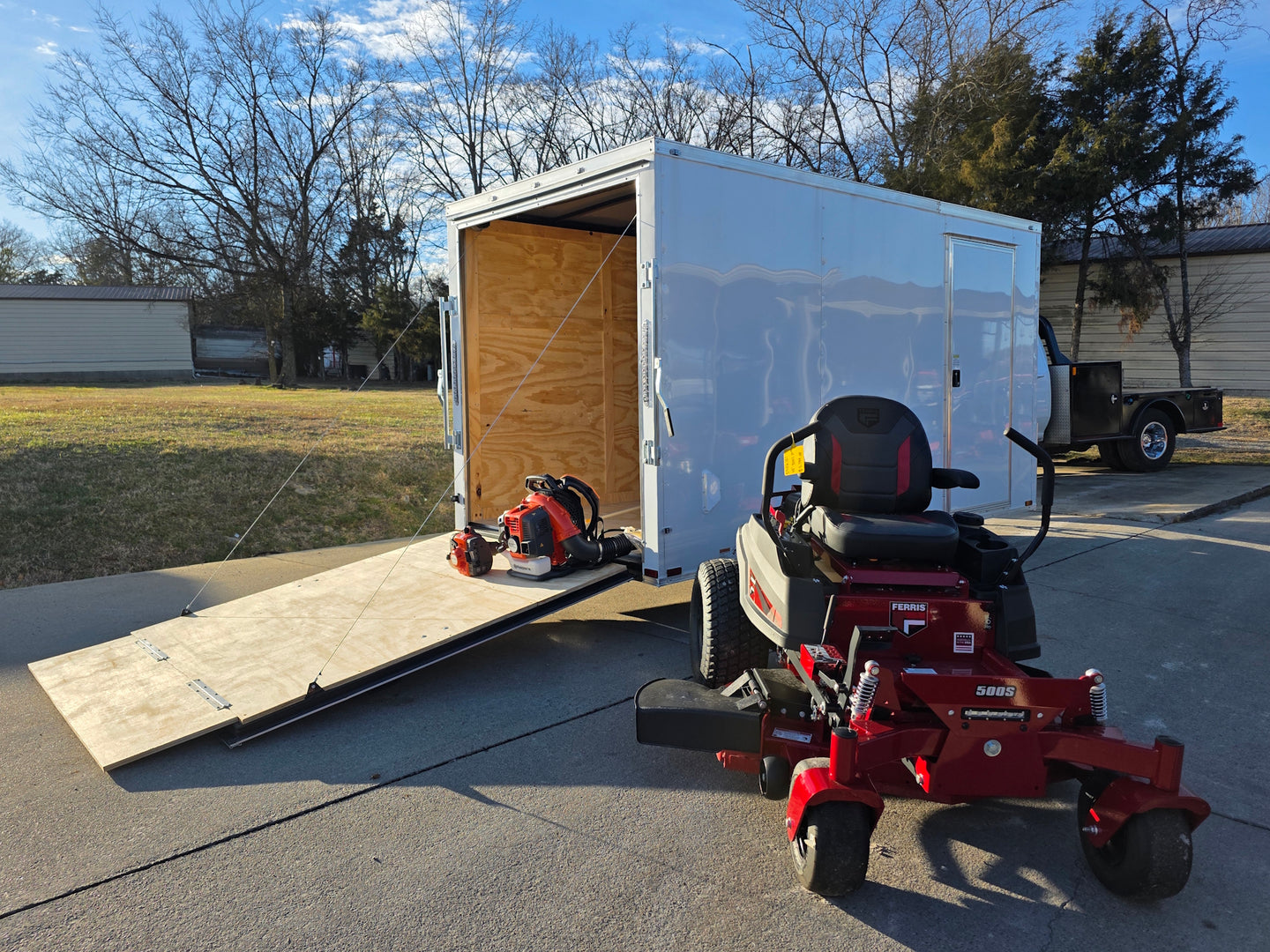 Ferris 5902101 500S 48" Zero Turn Mower Encl Trailer Handhelds Bundle left angled view picture 