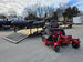 Ferris 5902103 61" 500S Zero Turn Mower Util Trailer Package left angled view picture with ramp down 