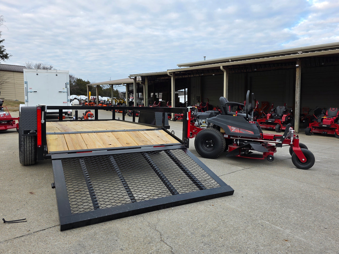 Ferris 5902144 42" 300S Zero Turn Mower Util Trailer Bundle back angled view picture with ramp down 