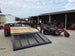 Ferris 5902144 42" 300S Zero Turn Mower Util Trailer Bundle back angled view picture with ramp down 