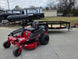 Ferris 5902144 42" 300S Zero Turn Mower Util Trailer Bundle front view picture with ramp down 