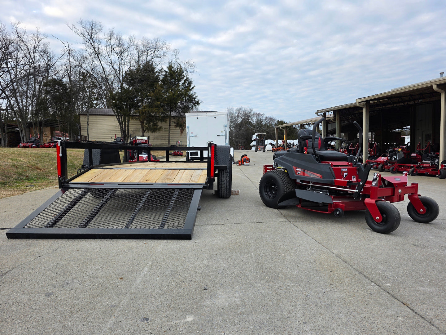 Ferris 5902144 42" 300S Zero Turn Mower Util Trailer Bundle left side view picture with ramp down